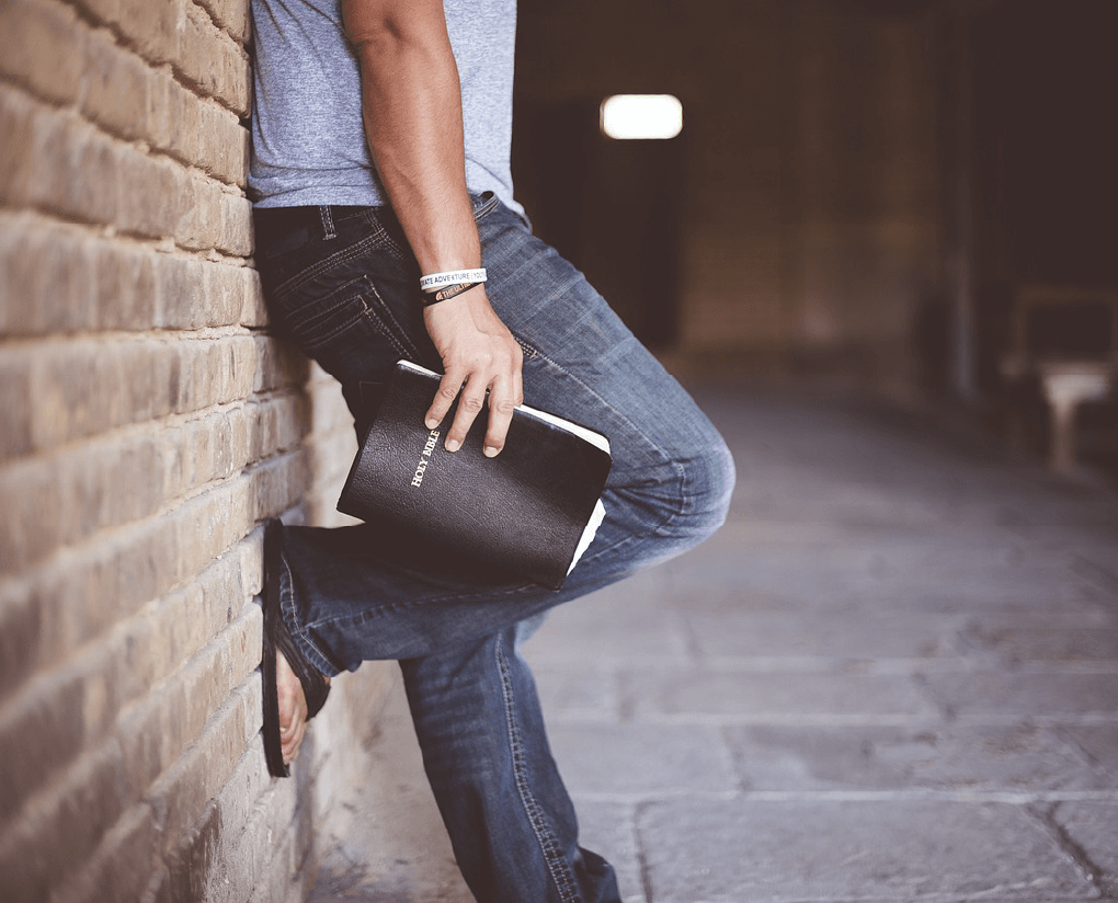 Man holding Bible